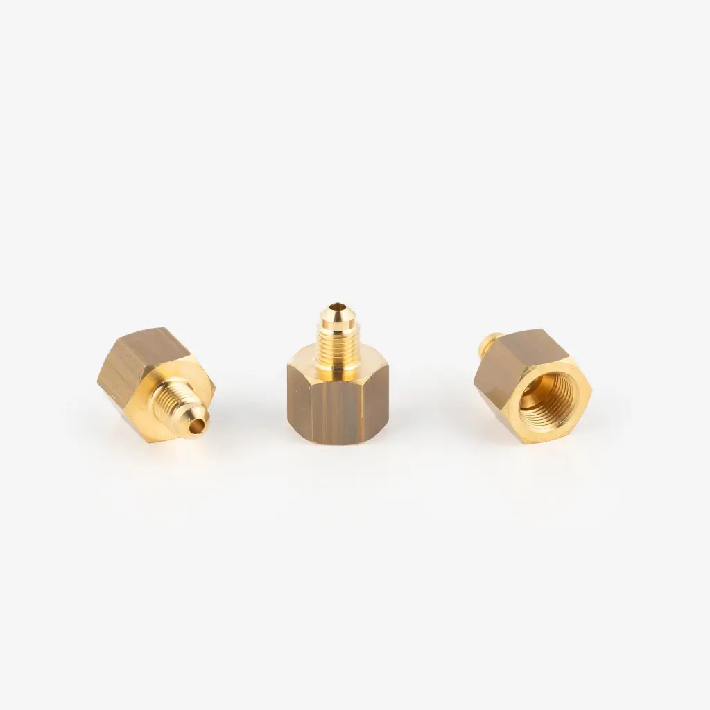 Supistusmutteri UR3-84 7150/24 1/4" SAEM x 1/2" SAEF